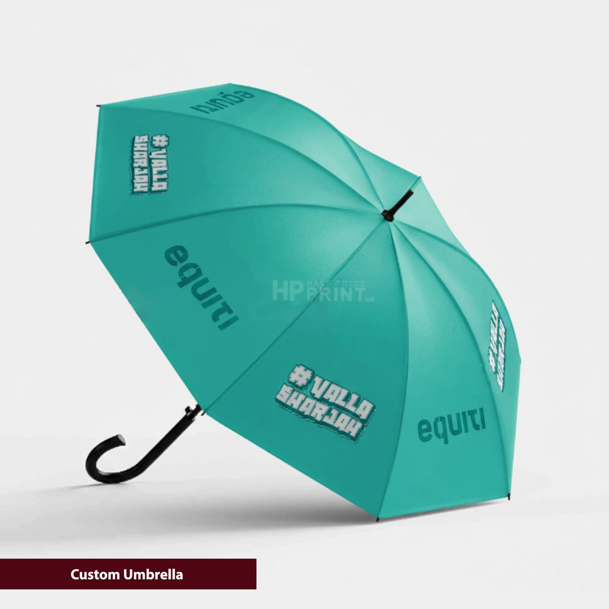 Teal umbrella with branding on a light gray background