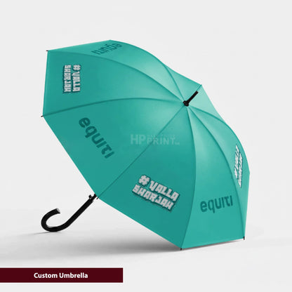 Teal umbrella with branding on a light gray background
