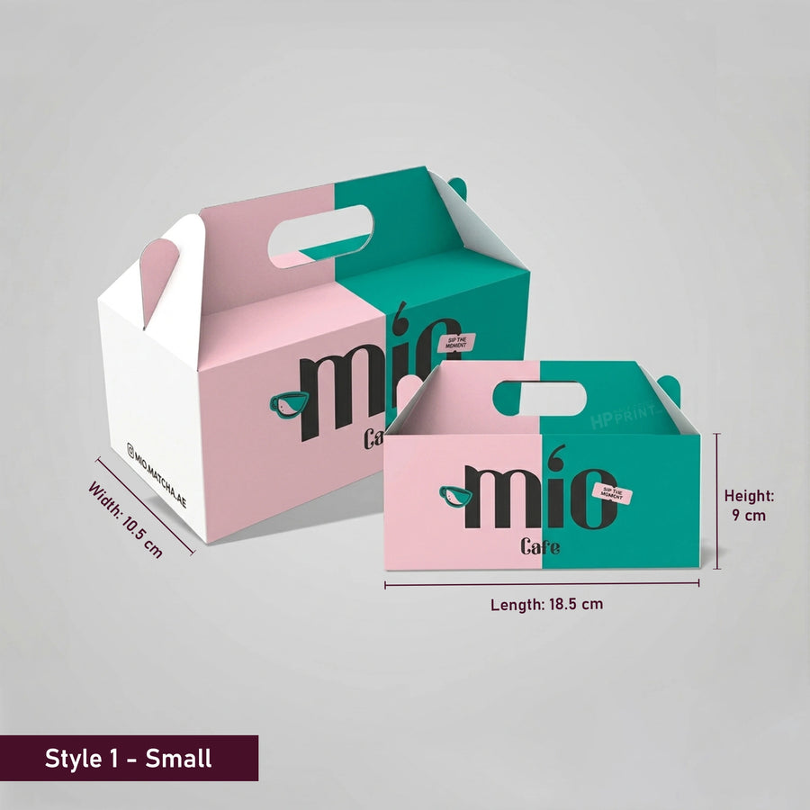 Two small gable boxes with 'mio' branding on a gray background